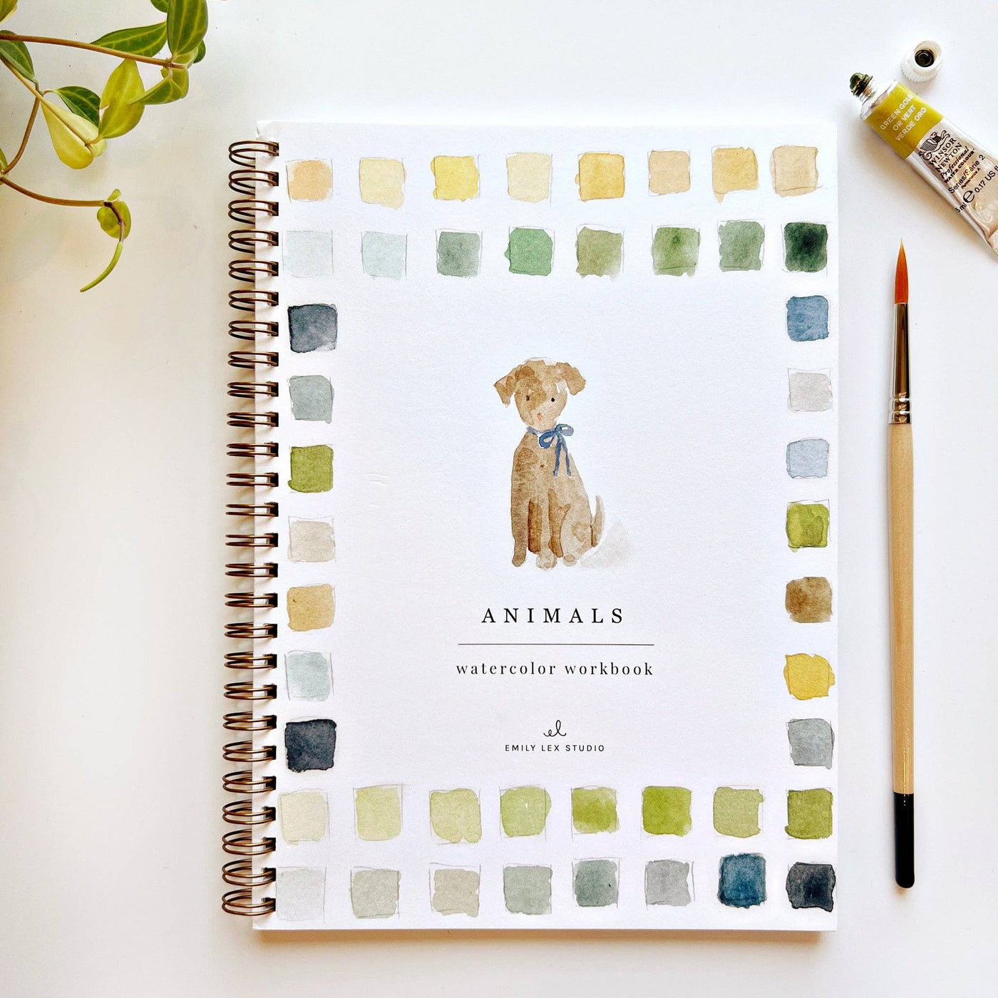 Watercolor workbook titled 'Animals' with a dog illustration on a white background.