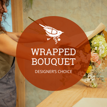 Fresh seasonal flowers in a custom hand-tied bouquet, expertly arranged and wrapped by a florist—unique for every occasion, no vase included.